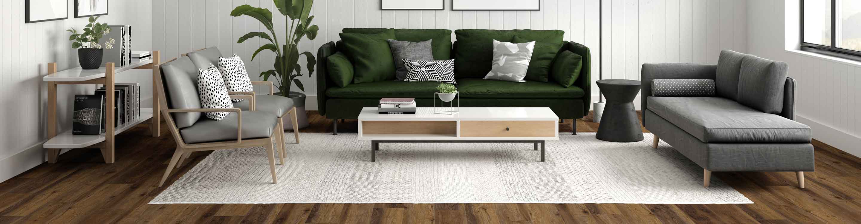 black and white pattered area rug in San Angelo midcentury living room with green couch